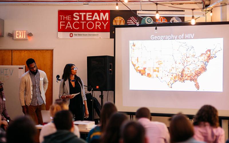 Students conduct presentations on HIV at the STEAM Factory in downtown Columbus. Students conduct presentations on HIV at the STEAM Factory in downtown Columbus.